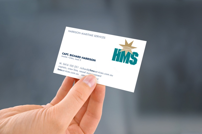 Hand-held Harrison Maritime Services “HMS” business card.