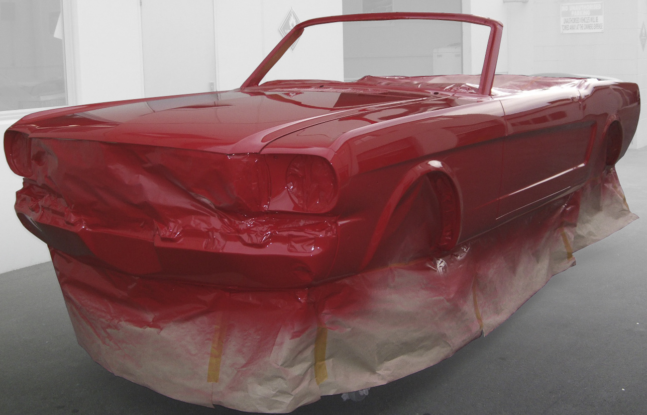 Red Mustang, freshly painted in Paint Shop spray booth.