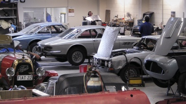 Line up of in-progress restorations of rare mid-century classics in the Panel Shop and at Auto Restorations. From front to back a Siata 280CS Balbo, an Alfa Romeo and a pair of Ferrari.