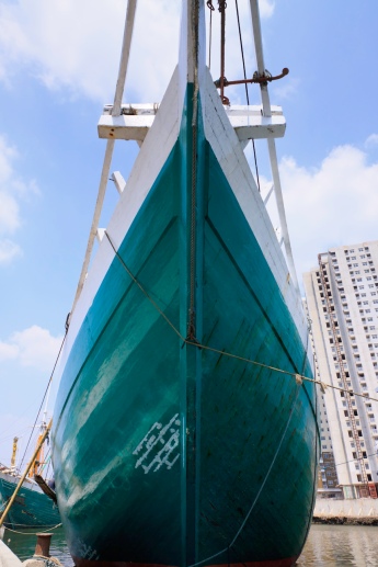 The prow of a magnificent Pinisi traditional Indonesian boat. Port of Sunda Kelapa, old harbour, Jakarta.